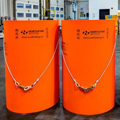 Orange Superchute sections with steel cable assemblies.